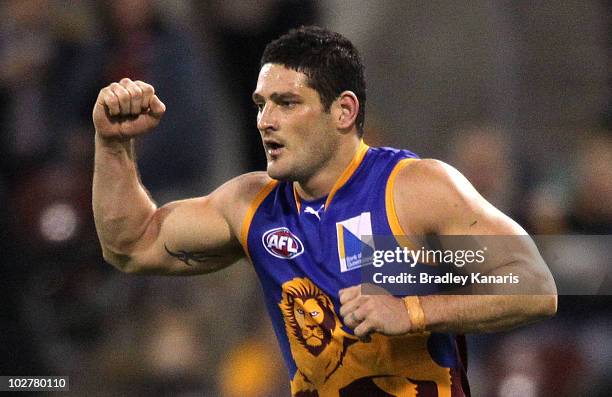 Brendan Fevola of the Lions celebrates after scoring a goal during the round 15 AFL match between the Brisbane Lions and the St Kilda Saints at The...