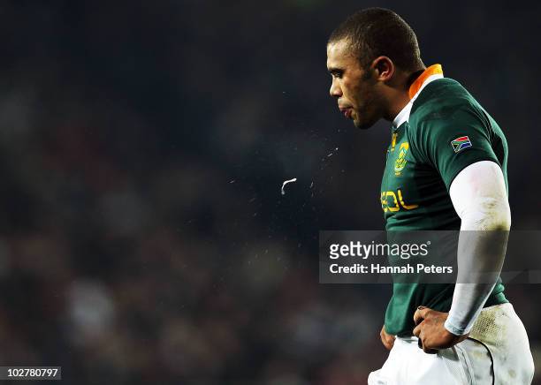 Bryan Habana of the Springboks spits during the Tri-Nations match between the New Zealand All Blacks and South Africa Springboks at Eden Park on July...
