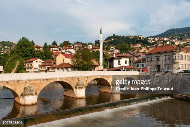 seher-cehajina ottoman bridge on the miljacka river in sarajevo, bosnia and herzegovina - sarajevo stock pictures, royalty-free photos & images