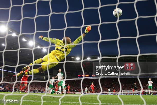 Darren Randolph of Republic of Ireland attempts to make a save as Gareth Bale of Wales scores his side's second goal during the UEFA Nations League B...