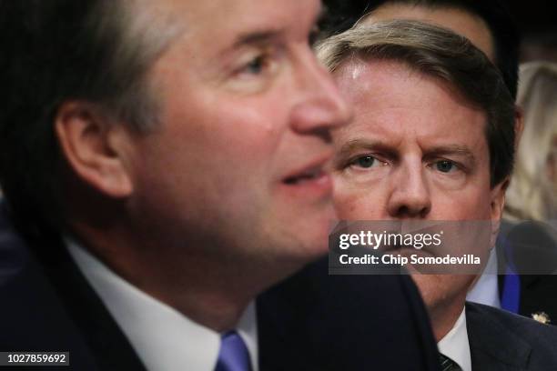 White House Counsel Don McGahn listens as Supreme Court nominee Judge Brett Kavanaugh testifies during the third day of his confirmation hearing...