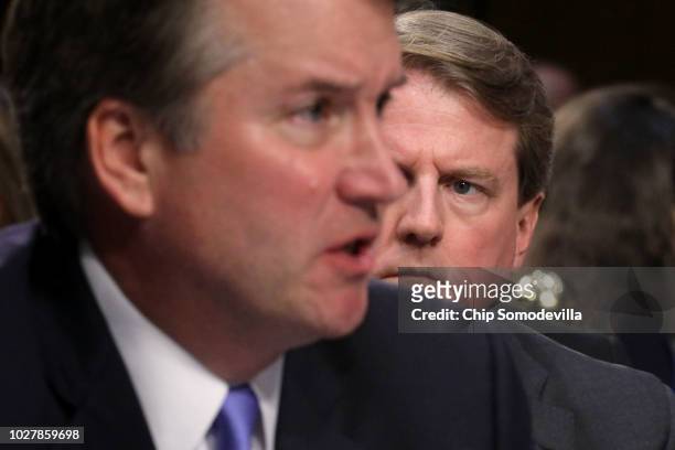 White House Counsel Don McGahn listens as Supreme Court nominee Judge Brett Kavanaugh testifies during the third day of his confirmation hearing...