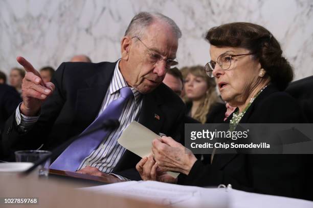 Senate Judiciary Committee Chairman Charles Grassley talks with ranking member Sen. Dianne Feinstein during the third day of Supreme Court nominee...
