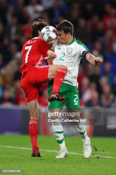 Joe Allen of Wales competes for a header with Seamus Coleman of Republic of Ireland during the UEFA Nations League B group four match between Wales...
