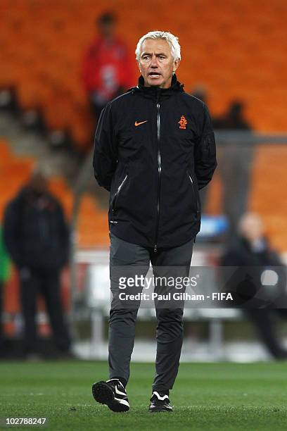 Bert van Marwijk head coach of the Netherlands talks to his players during a Netherlands training session, ahead of the 2010 FIFA World Cup Final, at...