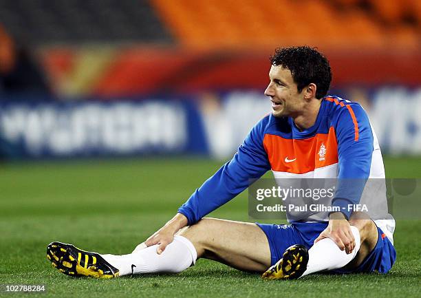 Mark Van Bommel of the Netherlands looks on during a Netherlands training session, ahead of the 2010 FIFA World Cup Final, at Soccer City Stadium on...