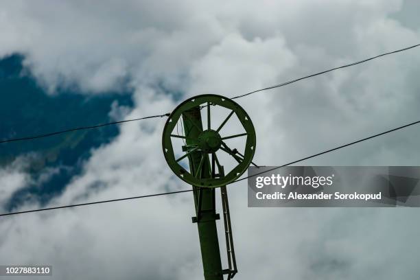 old abandoned ski lift on resort in alps, switzerland - ski lift summer stock pictures, royalty-free photos & images