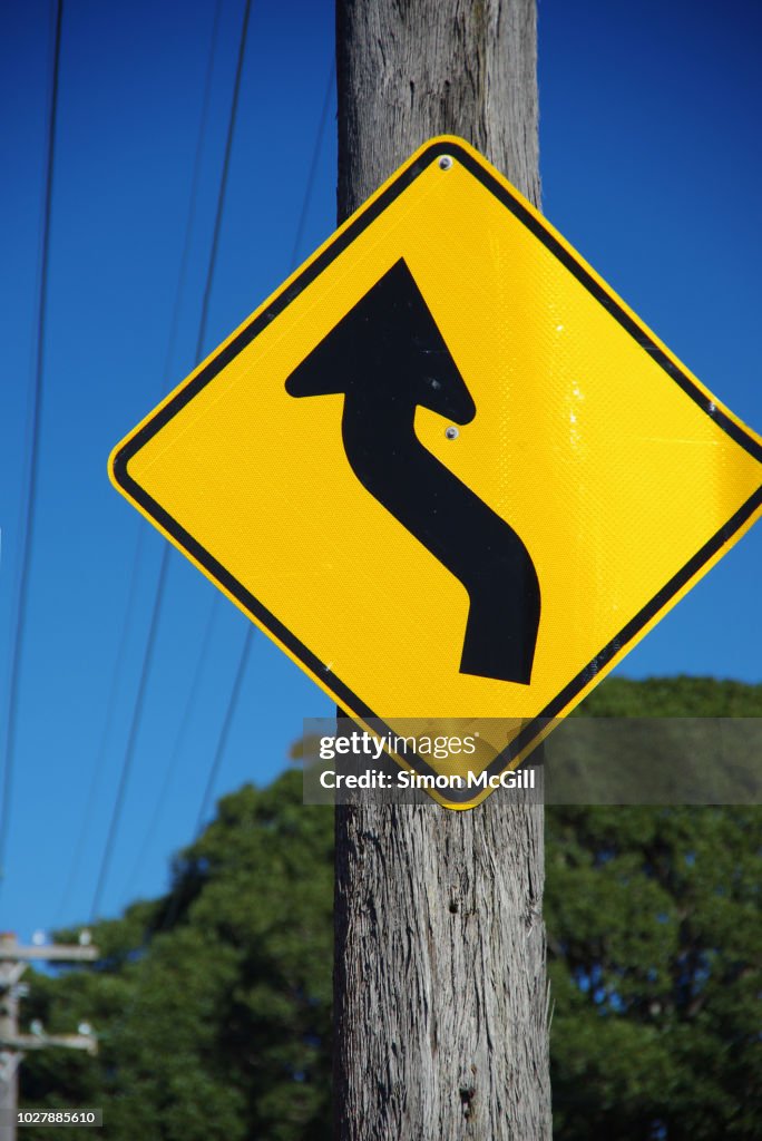 Reverse Curve Left Bend Road Warning Sign High-Res Stock Photo - Getty ...