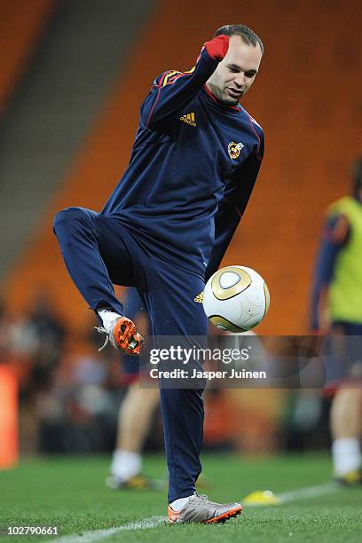 Andres Iniesta of Spain controls a ball during a Spain training session, ahead of the 2010 FIFA World Cup Final, at Soccer City Stadium on July 10,...