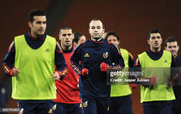 Andres Iniesta of Spain jogs during a Spain training session, ahead of the 2010 FIFA World Cup Final, at Soccer City Stadium on July 10, 2010 in...