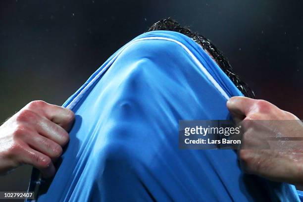 Diego Godin of Uruguay shows his dejection at the final whistle following the 2010 FIFA World Cup South Africa Third Place Play-off match between...