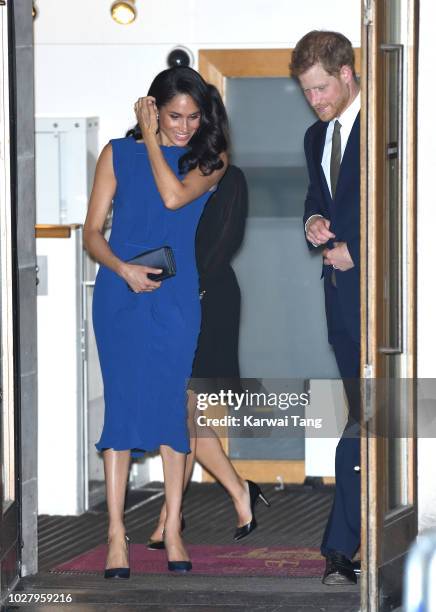 Meghan, Duchess of Sussex and Prince Harry, Duke of Sussex depart after attending the "100 Days To Peace" concert to commemorate the centenary of the...