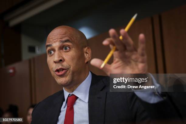 Sen. Cory Booker questions Supreme Court nominee Judge Brett Kavanaugh before the Senate Judiciary Committee on the third day of his Supreme Court...