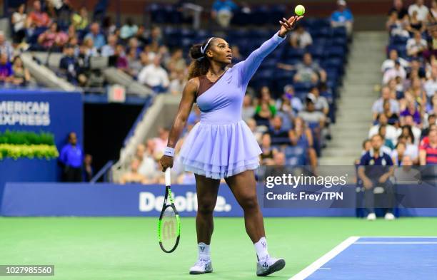 Serena Williams of the United States in action against Carina Witthoeft of Germany while wearing a tennis outfit designed by Virgil Abloh and...