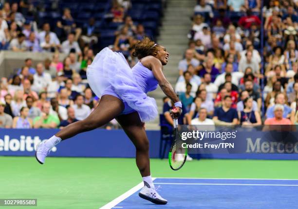Serena Williams of the United States in action against Carina Witthoeft of Germany while wearing a tennis outfit designed by Virgil Abloh and...