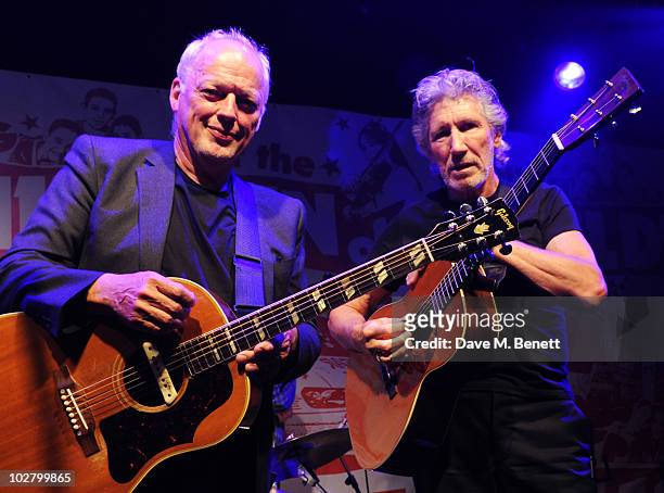 David Gilmour and Roger Waters perform at a benefit evening for The Hoping Foundation on July 10, 2010 in London, England.