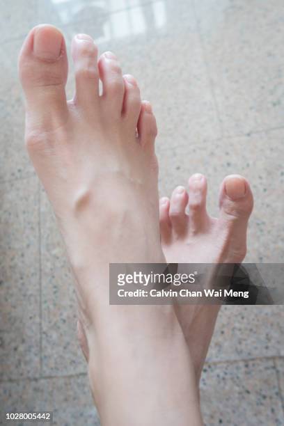 pair of feet - womens pretty feet stock pictures, royalty-free photos & images