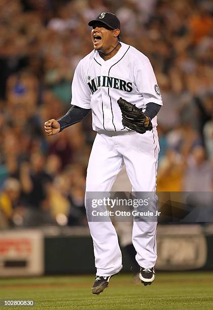 Starting pitcher Felix Hernandez of the Seattle Mariners jumps for joy after defeating the New York Yankees 4-1 at Safeco Field on July 10, 2010 in...