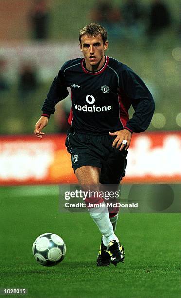 Phil Neville of Manchester United in action during the Opel Masters 2000 game between FC Bayern Munchen and Manchester United in Munich. Mandatory...