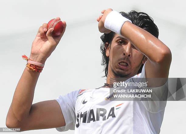 Indian cricketer Ishant Sharma delivers a ball during a net practice session at the R. Premadasa Stadium in Colombo on July 11, 2010. The Indian...