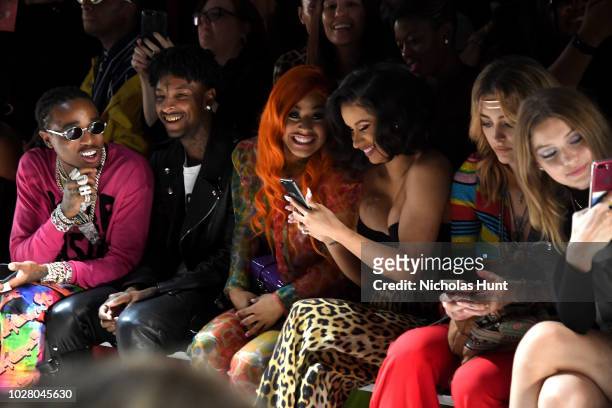 Quavo, 21 Savage, Hennessy Carolina, Cardi B, Paris Jackson and Gigi Hadid attend the Jeremy Scott front row during New York Fashion Week: The Shows...