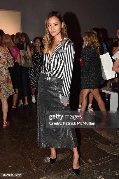 Jamie Chung attends the Nicole Miller Spring 2019 Runway Show at Industria Studios on September 6, 2018 in New York City.
