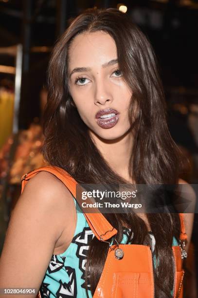 Model prepares backstage for the Jeremy Scott show during New York Fashion Week: The Shows at Gallery I at Spring Studios on September 6, 2018 in New...