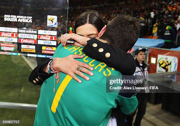 Iker Casillas of Spain hugs TV Presenter Sara Carbonero after the 2010 FIFA World Cup South Africa Final match between Netherlands and Spain at...