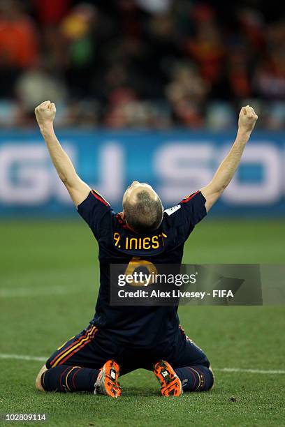 Andres Iniesta of Spain celebrates at the final whistle after the 2010 FIFA World Cup South Africa Final match between Netherlands and Spain at...