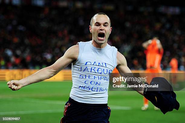 Andres Iniesta of Spain celebrates scoring his side's first goal during the 2010 FIFA World Cup South Africa Final match between Netherlands and...