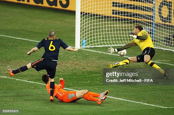 Andres Iniesta of Spain scores during the 2010 FIFA World Cup South Africa Final match between Netherlands and Spain at Soccer City Stadium on July...