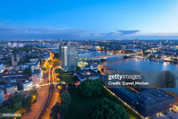 aerial view cityscape of cologne at dusk - cologne skyline stock pictures, royalty-free photos & images