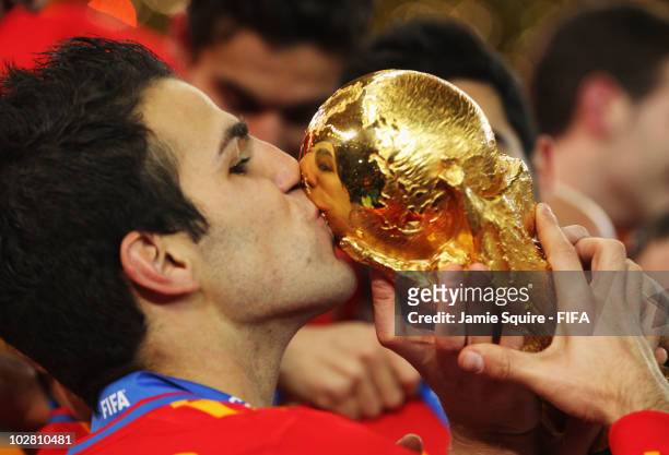 Francesc Fabregas of Spain kisses the World Cup after the 2010 FIFA World Cup South Africa Final match between Netherlands and Spain at Soccer City...