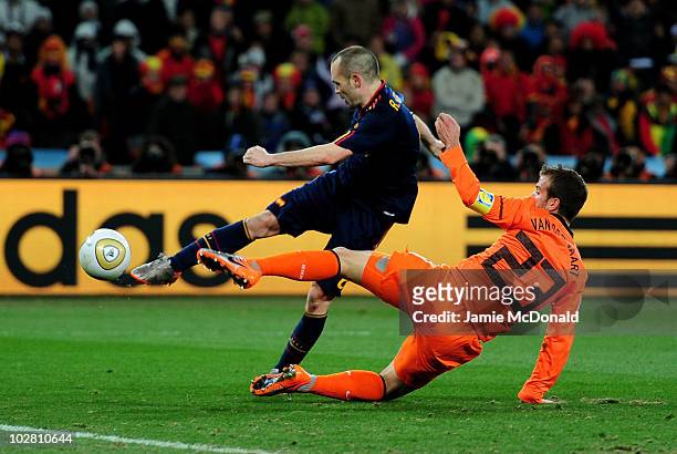 Andres Iniesta of Spain scores the winning goal during the 2010 FIFA World Cup South Africa Final match between Netherlands and Spain at Soccer City...