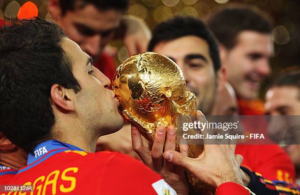 Francesc Fabregas of Spain kisses the World Cup after the 2010 FIFA World Cup South Africa Final match between Netherlands and Spain at Soccer City...