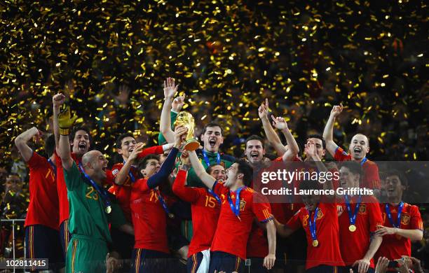 Iker Casillas, captain of Spain , and the Spain team celebrate victory with the World Cup trophy during the 2010 FIFA World Cup South Africa Final...