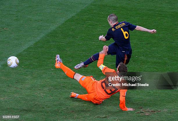 Andres Iniesta of Spain scores the winning goal during the 2010 FIFA World Cup South Africa Final match between Netherlands and Spain at Soccer City...