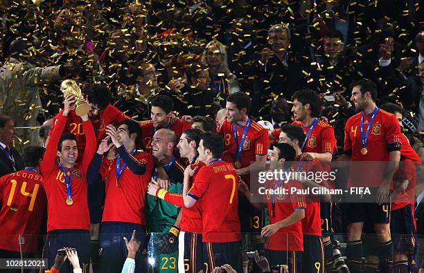 Francesc Fabregas of Spain celebrates as he lifts the World Cup with his team mates after the 2010 FIFA World Cup South Africa Final match between...