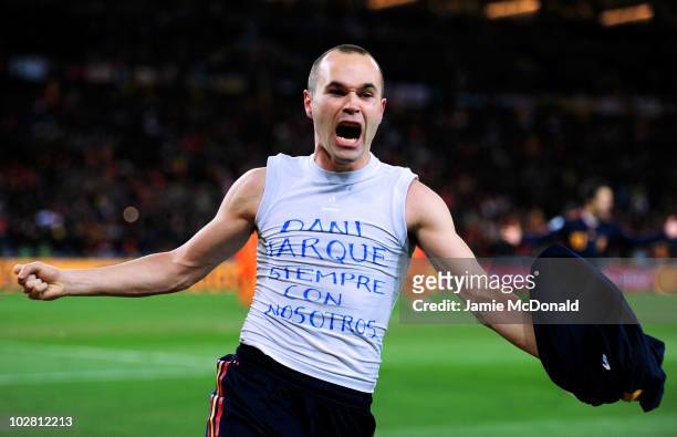 Andres Iniesta of Spain celebrates scoring his side's first goal during the 2010 FIFA World Cup South Africa Final match between Netherlands and...