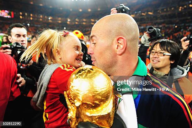 Jose Manuel Reina of Spain and his daughter Alma celebrate after the 2010 FIFA World Cup South Africa Final match between Netherlands and Spain at...