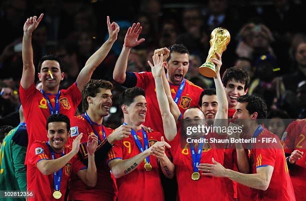 Spain celebrate winning the 2010 FIFA World Cup South Africa Final match between Netherlands and Spain at Soccer City Stadium on July 11, 2010 in...