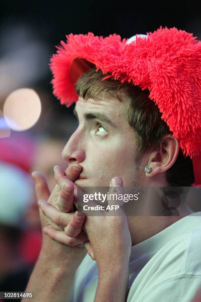 Dutch fan reacts in Rotterdam as the Netherlands football team lose the final match in the 2010 South Africa World Cup against Spain on July 11,...