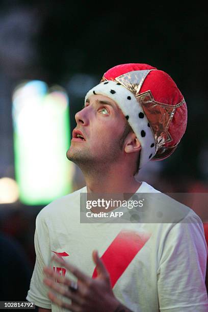 Dutch fan reacts in Rotterdam as the Netherlands football team lose the final match in the 2010 South Africa World Cup against Spain on July 11,...