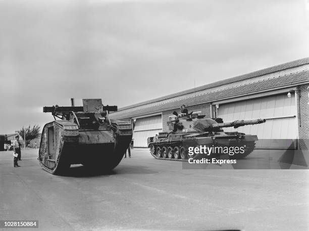 British heavy tank of World War I 'Mark I' alongside a recent one, UK, 6th August 1964.