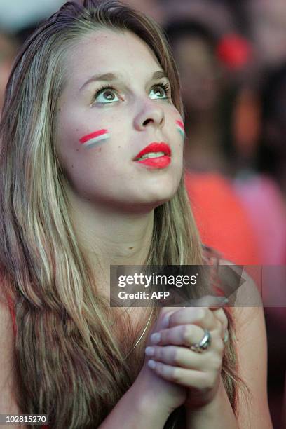 Dutch fans in Rotterdam watch as the Netherlands football team lose the final match in the 2010 South Africa World Cup against Spain on July 11,...