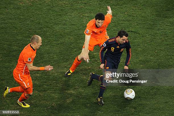 Gregory van der Wiel of the Netherlands controls the ball during the 2010  FIFA World Cup final match between the Netherlands and Spain at the Soccer  City Stadium in Johannesburg, South Africa