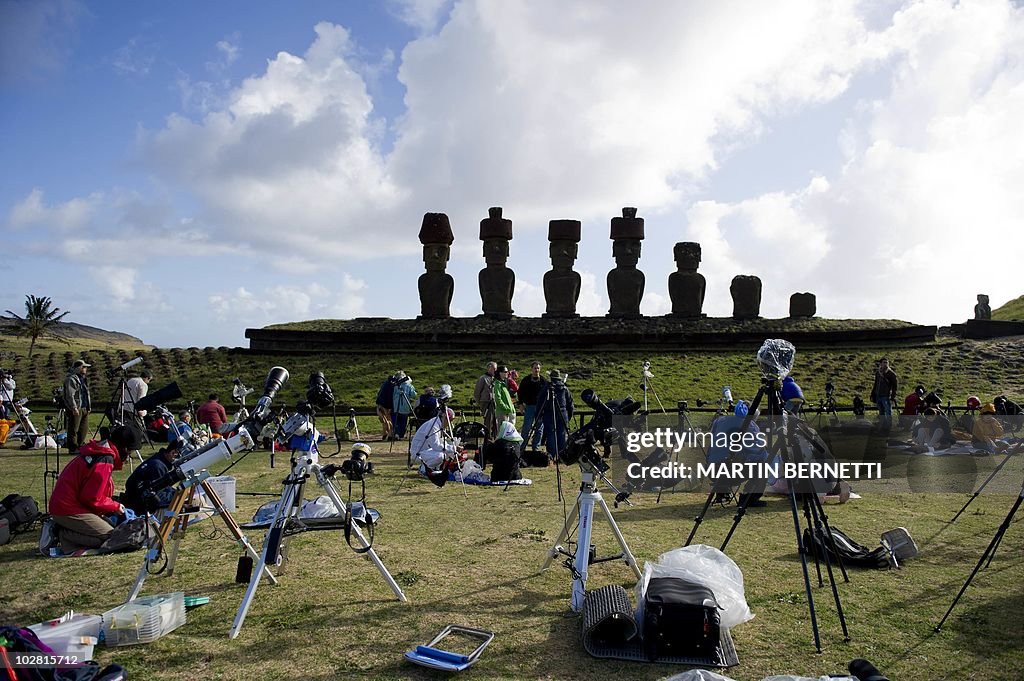 Tourists and  scientists prepare their e