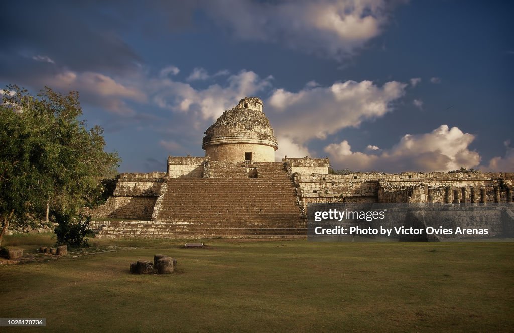 The Observatory at sunset in the pre-Columbian Maya site of Chichen Itza in YUcatan, Mexico