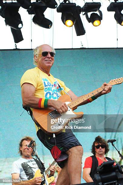 Musician Jimmy Buffett performs onstage at Jimmy Buffett & Friends: Live from the Gulf Coast, a concert presented by CMT at on the beach on July 11,...