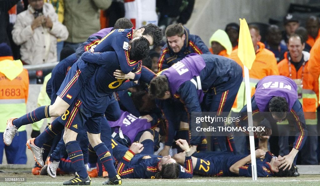 Spanish players celebrate after Spain's